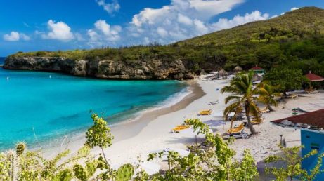 Informações atualizadas em outubro de 2026 sobre as melhores praias, passeios, preços, transporte e dicas para aproveitar Curaçao.